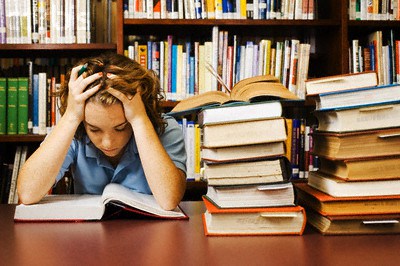 Teenage Student Studying Hard --- Image by © Randy Faris/Corbis