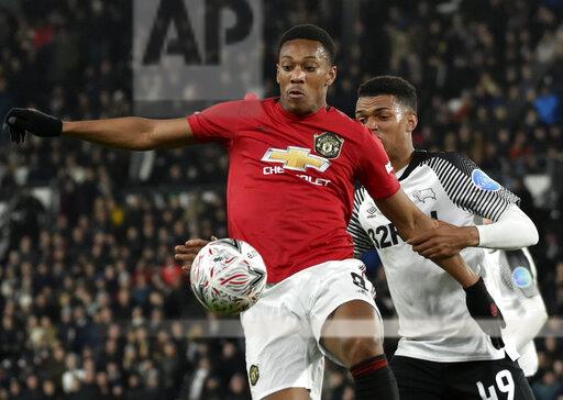 Manchester United Forward Anthony Martial fights for the ball against Derbys Morgan Whittaker during the fifth round of the FA Cup at Pride Park in Derby, England.  Manchester United would go on to win the match 3-0.