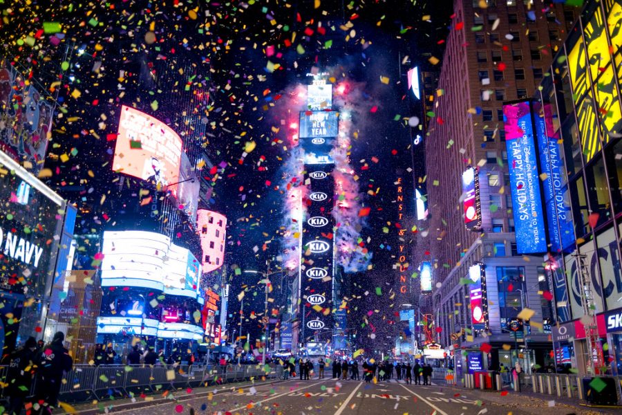 The Times Square New Years Eve Ball drops as confetti flies in an empty Times Square, early Friday, Jan. 1, 2021, as the area normally packed with revelers remained closed off due to the ongoing coronavirus pandemic. (AP Photo/Craig Ruttle)