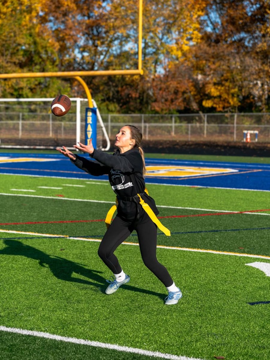 Evie H. '26 catches ball during the championship round.