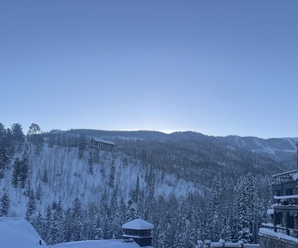 Telluride, a small ski town in Colorado covered in snow. I popular holiday location for it's snow and winter spirit.  