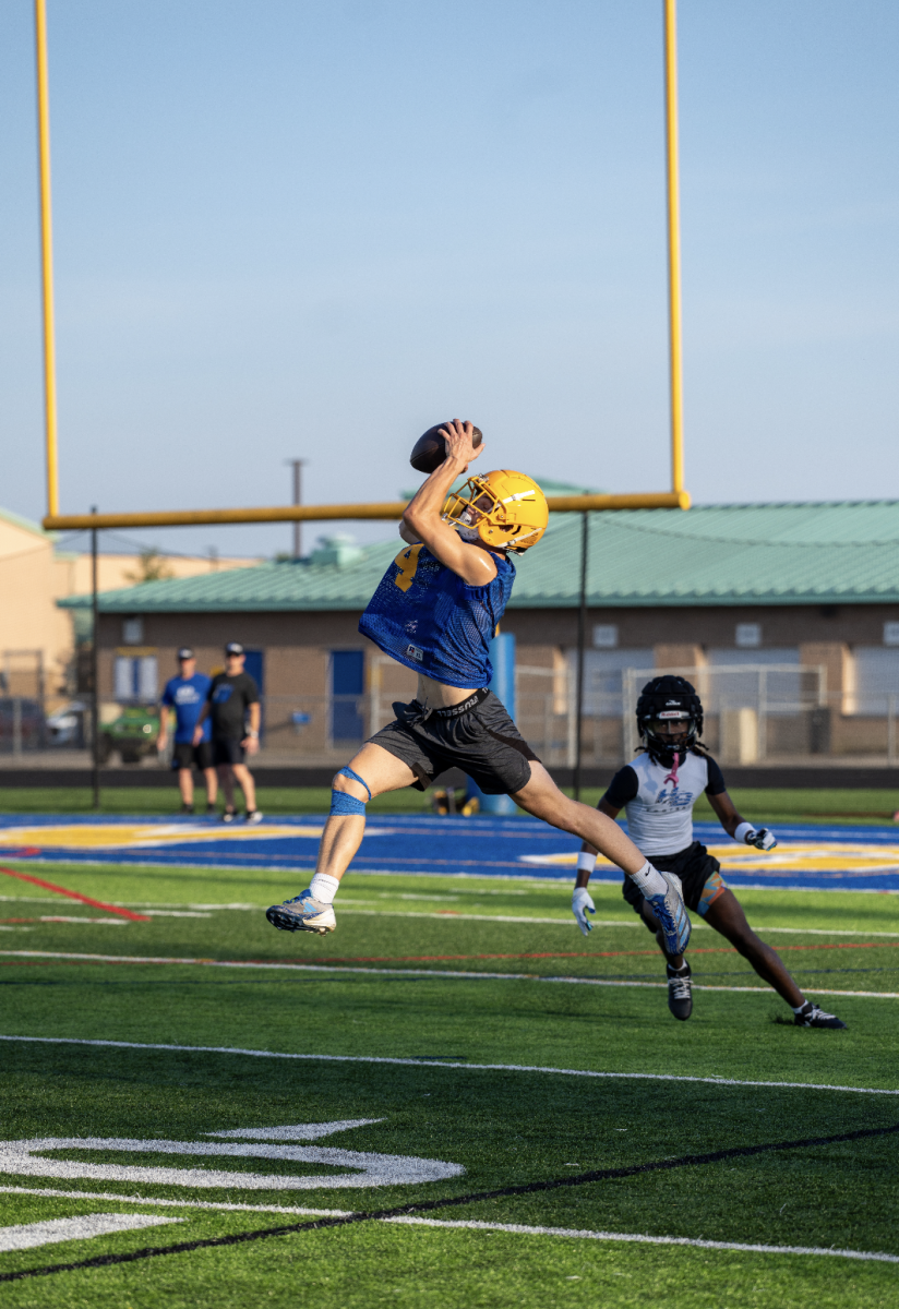 Ryan Wiesner ‘26, Wide Receiver, catches ball during preseason. Wiesner collected a total of four interceptions, and is in the top 60 players in Ohio. 