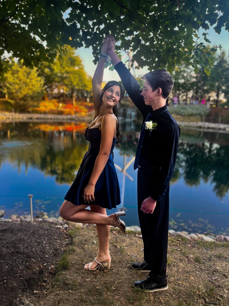 Mya Ruff poses with boyfriend for Homecoming pictures. The couple has been together for over a year. 