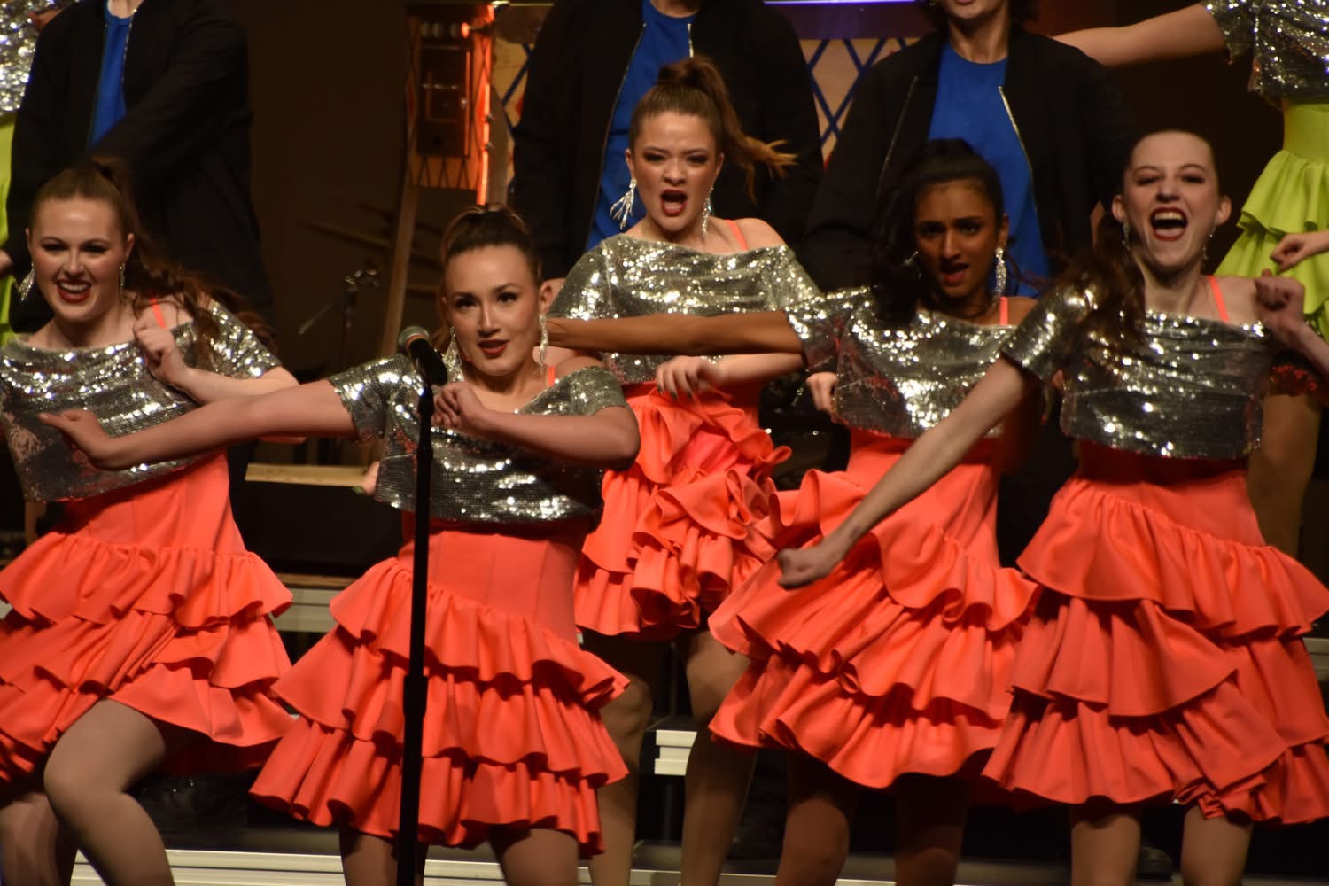 Keynote girls perform front stage. The girls have two costumes this year which are all altered by parents of the group. 
"The show would not be possible without the dads and moms who feed, built, and fund this program," director Tim Smith said. 