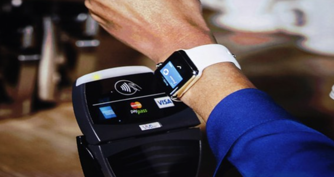 Buyer pays with Apple Watch. 